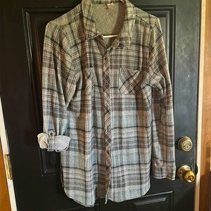 Turquoise/gray flannel. Size large. Buttons up